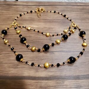 Elegant Gold and Black Beaded Necklace